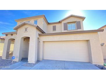 Charming two-story home with a neutral color scheme and a two car garage at 7425 W Crown King Rd, Phoenix, AZ 85043