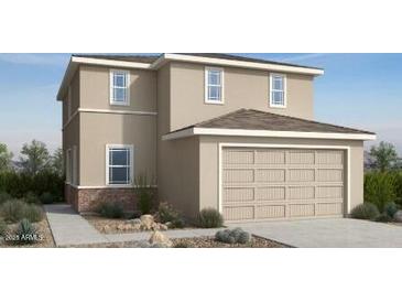 Two-story home with a neutral color scheme and a two-car garage with natural rock landscaping at 25161 N 167Th Ave, Surprise, AZ 85387