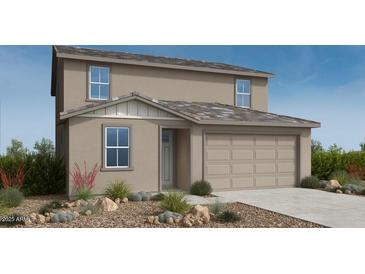 Charming two-story home with a neutral color palette and a well-manicured, low maintenance desert landscape at 25168 N 167Th Ave, Surprise, AZ 85387