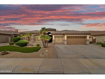 Inviting single-story home featuring desert landscaping and a two-car garage at 2612 S Jacob St, Gilbert, AZ 85295