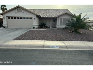 Charming single-story home with a desert landscape and a neutral-toned exterior at 20298 N 108Th Ln, Sun City, AZ 85373