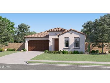 Charming single-story home with a tile roof, a well-manicured lawn, and a two-car garage at 3272 E Ranchhand Dr, San Tan Valley, AZ 85140