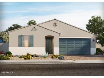 Charming single-story home with neutral stucco exterior, stone accents, landscaped front yard and a two-car garage at 150 N 175Th Ave, Goodyear, AZ 85338