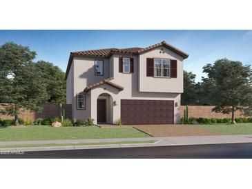 Charming two-story home with a two-car garage, and landscaped yard at 4552 S 232Nd Dr, Buckeye, AZ 85326