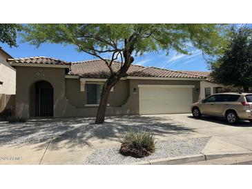 Charming single-story home with a well-maintained yard and inviting curb appeal in a sunny neighborhood at 6421 S 23Rd Dr, Phoenix, AZ 85041