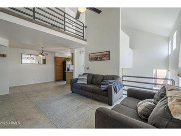 Cozy living room features neutral tones, comfortable seating, and a stylish loft area at 154 W 5Th St # 212, Tempe, AZ 85281