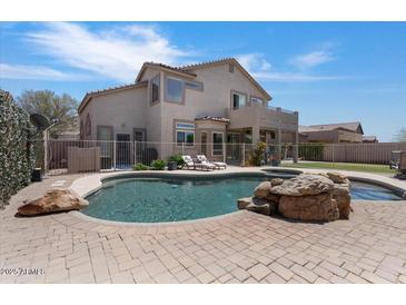 Inviting backyard with a pool, spa, and lounge area for relaxing and entertaining at 3812 N Barron --, Mesa, AZ 85207