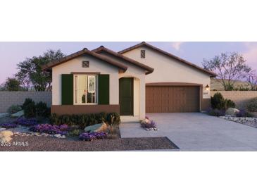 Charming single-story home featuring a two-car garage and desert landscaping at 25144 N 156Th Ln, Surprise, AZ 85387