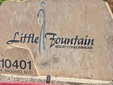 Little Fountain Resort Condominiums signage with street address and a beige textured background at 10401 N Saguaro Blvd # 123, Fountain Hills, AZ 85268