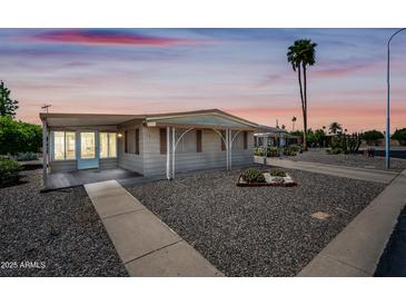 Charming single story home featuring well-maintained landscaping and classic desert appeal at 3160 E Main St # 110, Mesa, AZ 85213