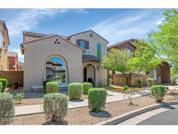 Charming two-story home with a landscaped front yard and inviting curb appeal, perfect for a Gathering at 3932 E Melinda Dr, Phoenix, AZ 85050