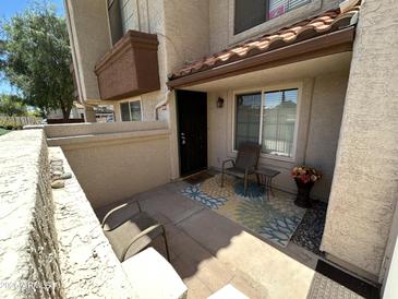 Charming front porch with seating area and vibrant rug, perfect for enjoying the outdoors at 839 S Westwood S -- # 169, Mesa, AZ 85210