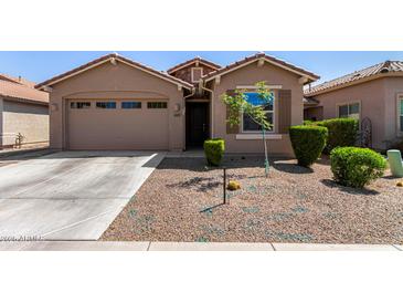 Charming single-story home featuring a low-maintenance desert landscape and a welcoming front entry at 44837 W Horse Mesa Rd, Maricopa, AZ 85139