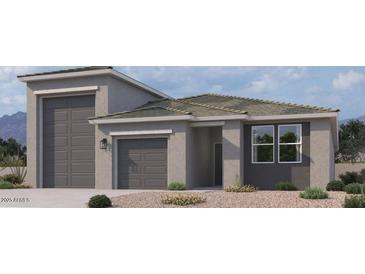 A charming single-Gathering home features a two-car garage, neutral color palette and well manicured desert landscaping at 47230 W Cansados Rd, Maricopa, AZ 85139