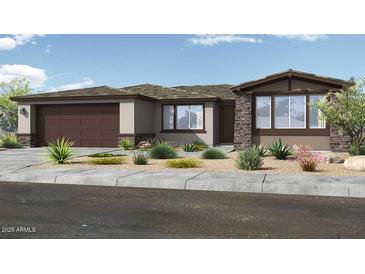 Charming single-story home featuring desert landscaping, a two-car garage, and a welcoming front entrance at 39604 N Kaden Ln, San Tan Valley, AZ 85140