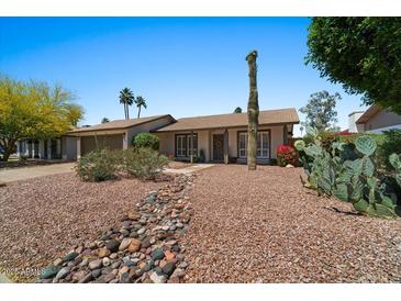 Landscaped front yard with desert plants, stone accents and a charming single-story home at 782 W Gail Dr, Chandler, AZ 85225