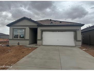 Charming single-story home with a two-car garage and a cozy, inviting feel at 4227 E Kolin Ln, San Tan Valley, AZ 85143