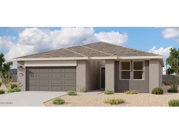 Charming single-story home featuring a two-car garage, neutral paint, and desert landscaping at 46904 W Coe St, Maricopa, AZ 85139