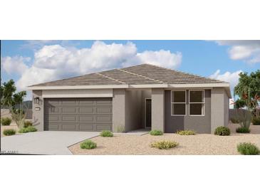 Charming single-story home featuring a two-car garage and a well-maintained, low-maintenance desert landscape at 46904 W Coe St, Maricopa, AZ 85139