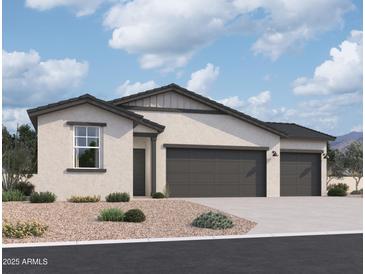 Charming single-story home with a three-car garage and low-maintenance desert landscaping at 46887 W Old Timer Rd, Maricopa, AZ 85139