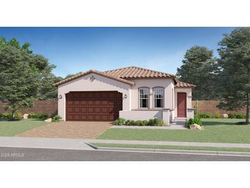 Charming single-story home with a two-car garage, tiled roof, and well-manicured lawn at 3114 S 155Th Ln, Goodyear, AZ 85338