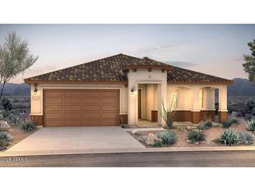 Charming single-story home with a tile roof, desert landscaping, and a spacious two-car garage at 18702 N 267Th Dr, Buckeye, AZ 85396