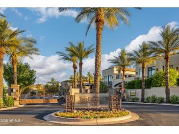 Elegant gated community entrance, showcasing lush landscaping and a welcoming atmosphere at 2 Biltmore Est # 309, Phoenix, AZ 85016