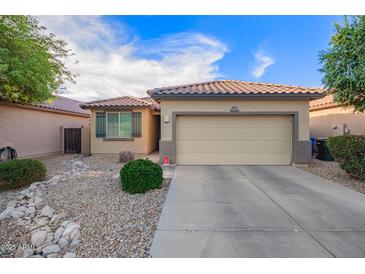 Charming single-story home with desert landscaping and a two-car garage at 2734 W Bowker St, Phoenix, AZ 85041