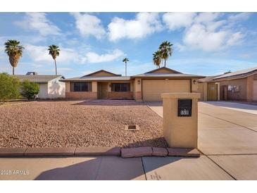 Charming single-story home with low-maintenance desert landscaping and inviting curb appeal at 1511 W Mesquite St, Chandler, AZ 85224