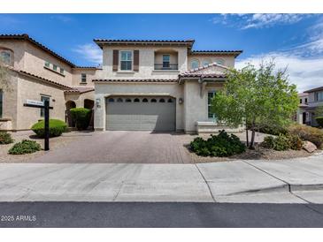 Elegant two-story home with a private driveway and a two-car garage at 214 W Beverly Ln, Phoenix, AZ 85023