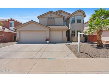 Charming two-story home with a three-car garage and well-maintained landscaping at 43507 W Cydnee Dr, Maricopa, AZ 85138