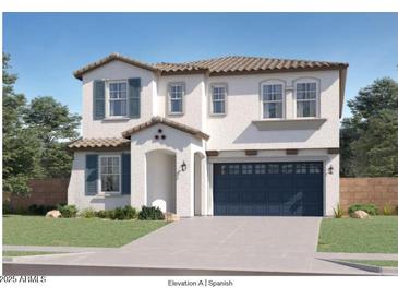 Charming two-story home with a Spanish-style elevation, blue shutters, and a two-car garage at 8331 E Petunia Ave, Mesa, AZ 85212