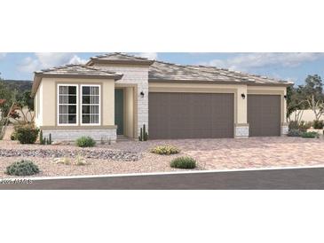 Charming single-story home featuring a two-car garage and neutral color palette at 18195 W Hess St, Goodyear, AZ 85338
