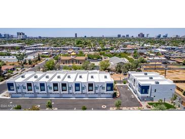 New condominiums boast a contemporary exterior with a serene urban backdrop at 1642 E Monte Vista Rd # 10, Phoenix, AZ 85006