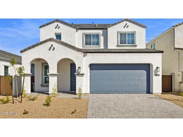 Beautiful two-story home boasting a well-kept front yard and a spacious two-car garage at 17837 W Mission Ln, Waddell, AZ 85355