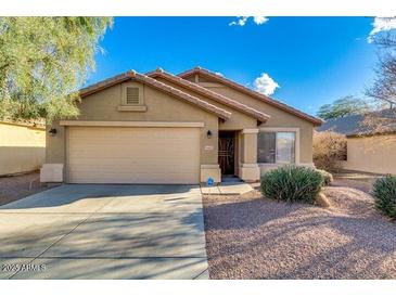 Charming single story home boasts desert landscaping and a two car garage at 4605 W Fawn Dr, Laveen, AZ 85339