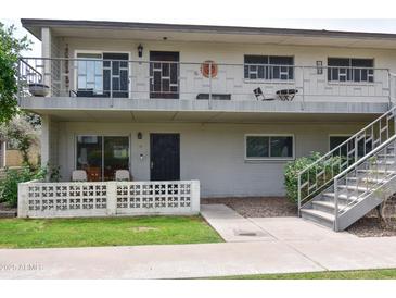 Charming two-story apartment building with a welcoming entrance and well-maintained landscaping at 5550 N 12Th St # 15, Phoenix, AZ 85014