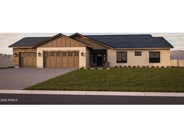 Charming single story home featuring a two car garage, desert landscaping and a covered entryway at 11203 E Crescent Ave, Mesa, AZ 85208