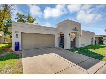 Charming home with a private courtyard entrance and attached two-car garage at 8935 N 82Nd St, Scottsdale, AZ 85258