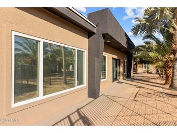Property's exterior showcasing architectural details and desert landscaping at 3233 N 37Th St # 5, Phoenix, AZ 85018
