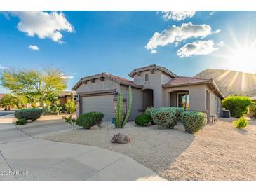 Charming home featuring desert landscaping, a two-car garage, and a desert-toned facade at 343 W Twin Peaks Pkwy, San Tan Valley, AZ 85143