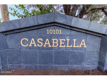 Attractive community sign reading 'Casabella' along with the property number at 10101 N Arabian Trl # 2018, Scottsdale, AZ 85258