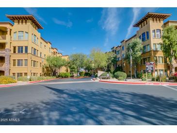 View of buildings and street in the Torrana community of Scottsdale, Arizona, on a sunny day at 5450 E Deer Valley Dr # 4199, Phoenix, AZ 85054