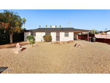 Charming single-story home featuring a low-maintenance desert landscape at 3532 N Carhill Ave, Scottsdale, AZ 85251