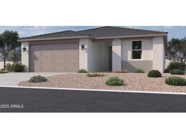 Charming single-story home with a neutral color scheme and a well-manicured front yard at 4521 S 95Th Dr, Tolleson, AZ 85353