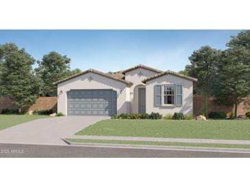 Charming single-story home with stucco siding, tile roof, two car garage, and desert landscaping at 16722 W Audrey Ln, Surprise, AZ 85387
