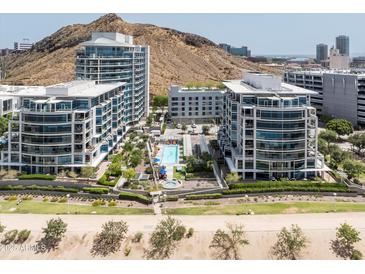 Stunning aerial view of modern condos with a pool and manicured landscaping at 140 E Rio Salado Pkwy # 512, Tempe, AZ 85281