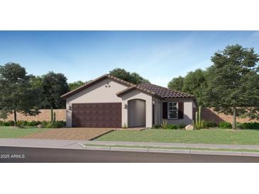 Charming single-story home with a tile roof, stucco siding, and a two-car garage at 23372 W Sonrisas St, Buckeye, AZ 85326