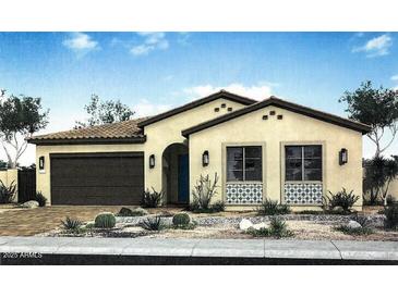 Inviting single-story home featuring a desert landscape, a two car garage, and a tile roof at 3718 E Gold Mountain Ave, San Tan Valley, AZ 85143
