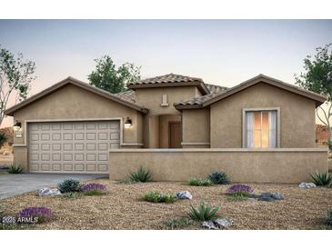 Attractive single-story home featuring a neutral-toned stucco finish, tile roof, and a two-car garage at 42930 W Palo Abeto Dr, Maricopa, AZ 85138